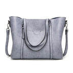 Leather handbag with large capacity and adjustable shoulder strap