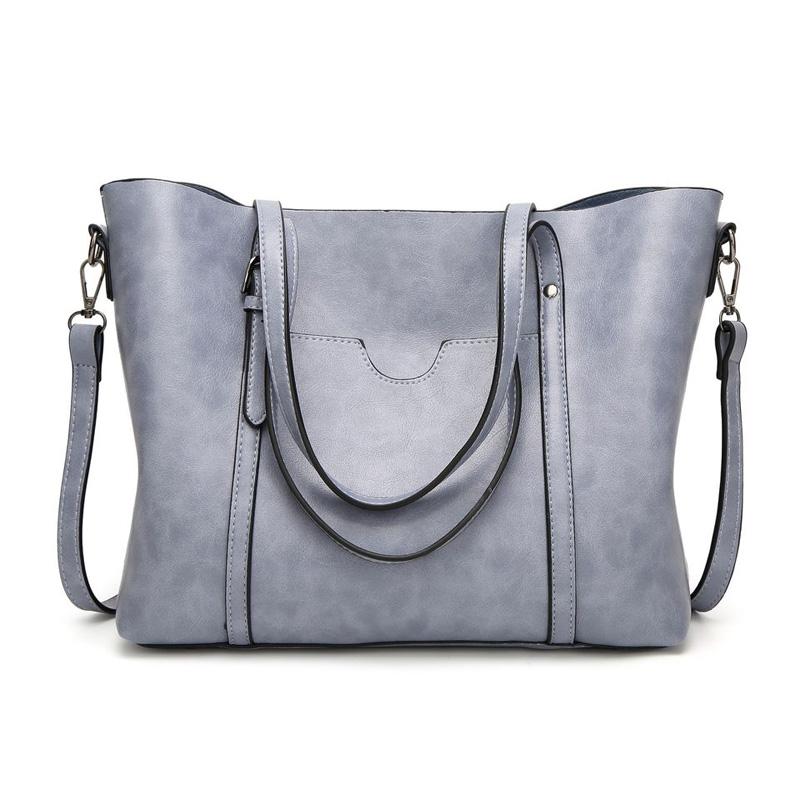 Leather handbag with large capacity and adjustable shoulder strap