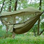 Outdoor hammock with mosquito net and sunshade