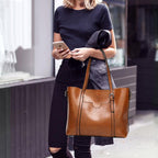 Leather handbag with large capacity and adjustable shoulder strap