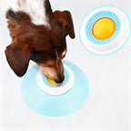 Bowl with floating ball for slow feeding