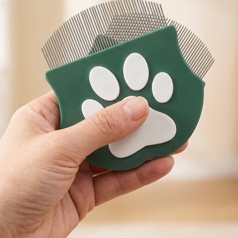 Pet comb with paw print handle