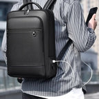 Leather backpack with USB charging port for 15.6-inch laptop