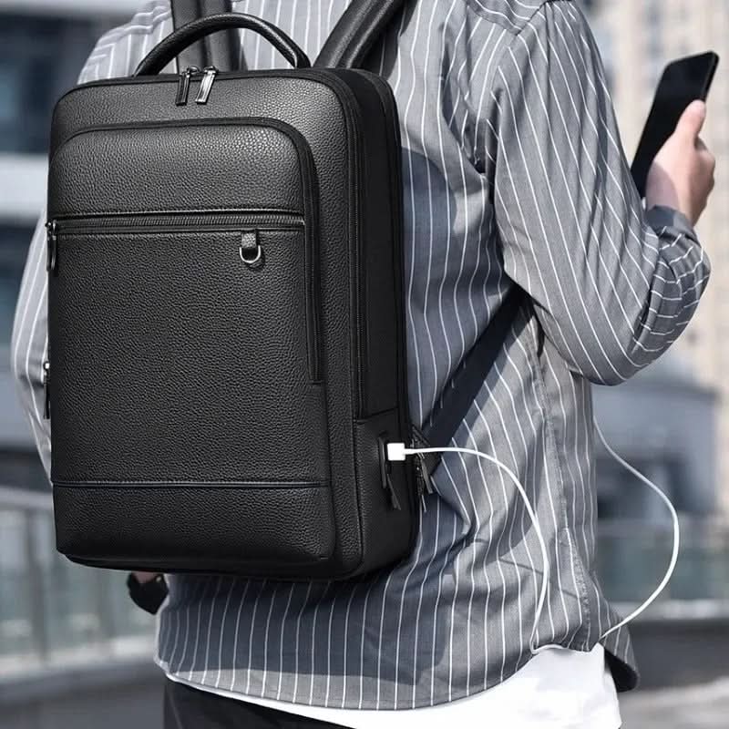 Leather backpack with USB charging port for 15.6-inch laptop