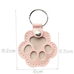 Leather paw keychain with storage compartment