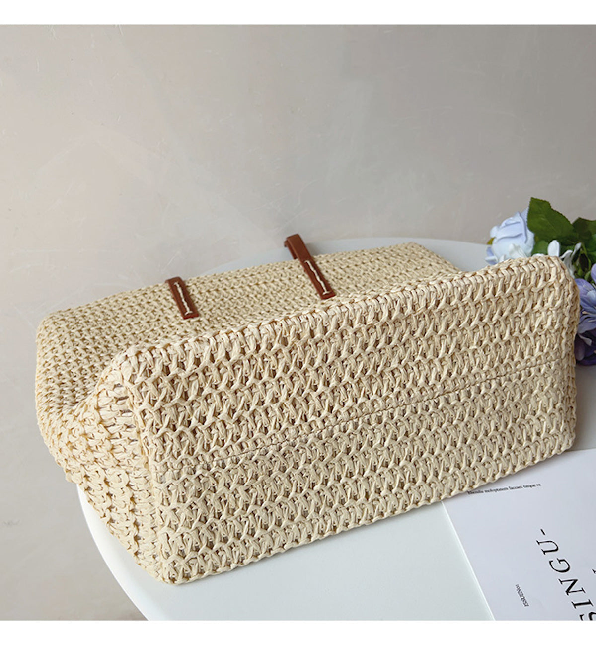 Woven basket bag with leather handles