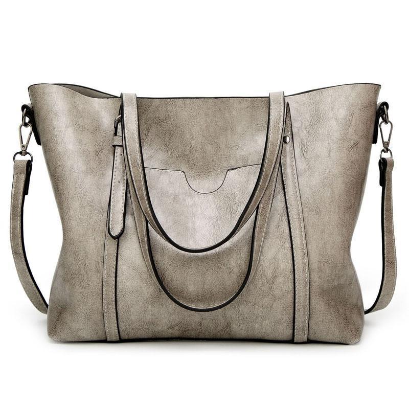 Leather handbag with large capacity and adjustable shoulder strap