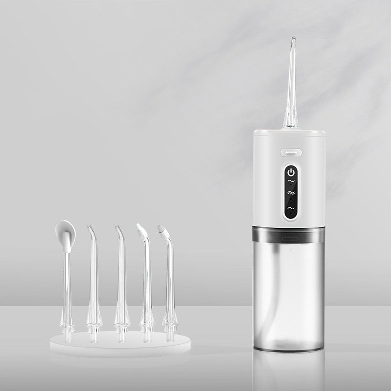 Electric oral irrigator with 3 pressure settings