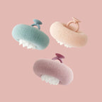 Shower sponge with massage particles and handle