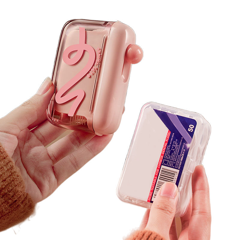 Zahnseide-Spender mit Knopfdruck
