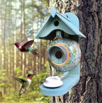Hand-painted teapot birdhouse made of resin for garden