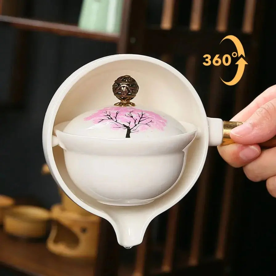 Teekanne ceramic with cherry blossom decor and rotating strainer