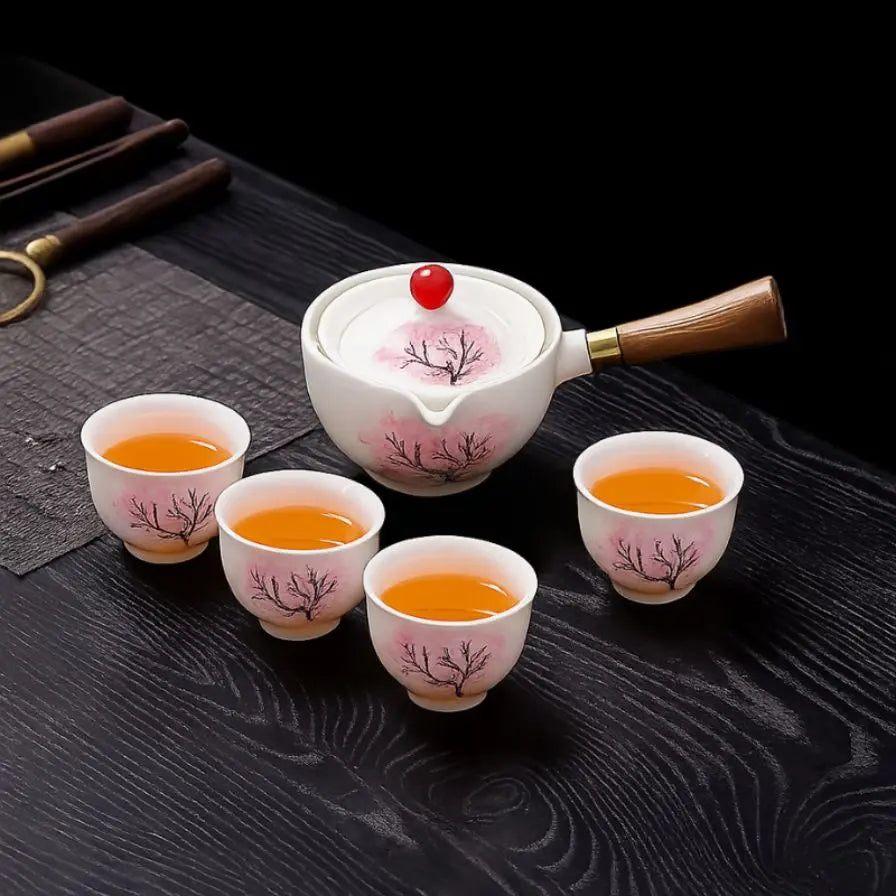 Teekanne ceramic with cherry blossom decor and rotating strainer