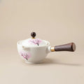 Teekanne ceramic with cherry blossom decor and rotating strainer