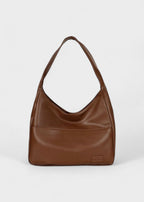 Shoulder bag made of faux leather with external pocket
