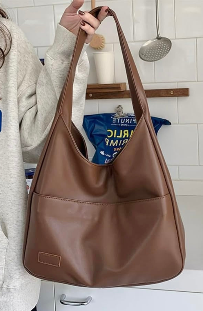 Shoulder bag made of faux leather with external pocket