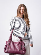 Handtasche mit Reißverschlusstaschen und abnehmbarem Trageriemen