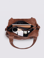 Handtasche mit Reißverschlusstaschen und abnehmbarem Trageriemen