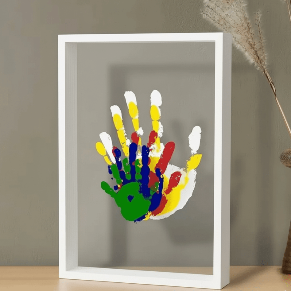 Baby memory frame with clay for hand and footprint impressions
