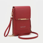 Crossbody phone bag with touchscreen window and card slots, faux leather