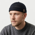 Breathable mesh cap with adjustable strap