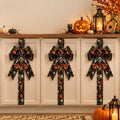 Leuchtende Halloween-Türschleife mit Kürbismotiv
