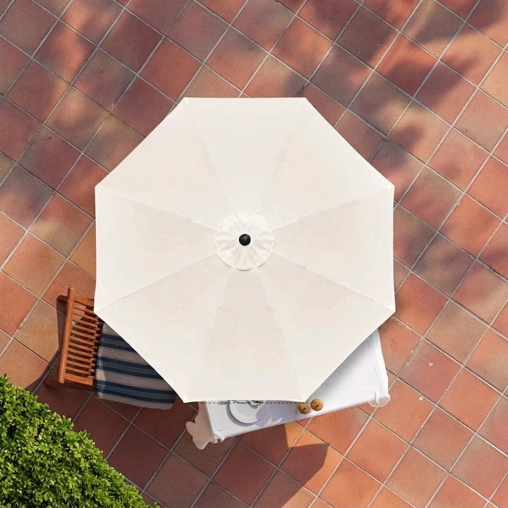 Water-repellent replacement parasol cover with ventilation opening