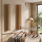 Foldable wall-mounted wooden coat rack with a space-saving design