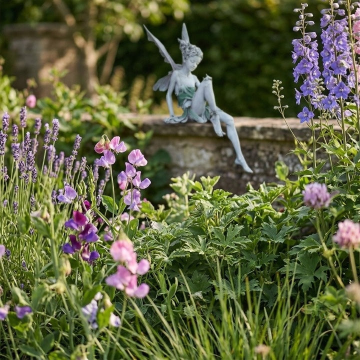 Garden Figurine Sitting Fairy Made of Resin