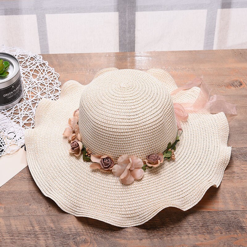Summer hat with floral decoration for women