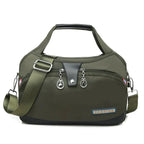 Women's handbag with shoulder strap and multiple compartments