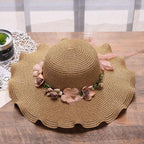 Summer hat with floral decoration for women