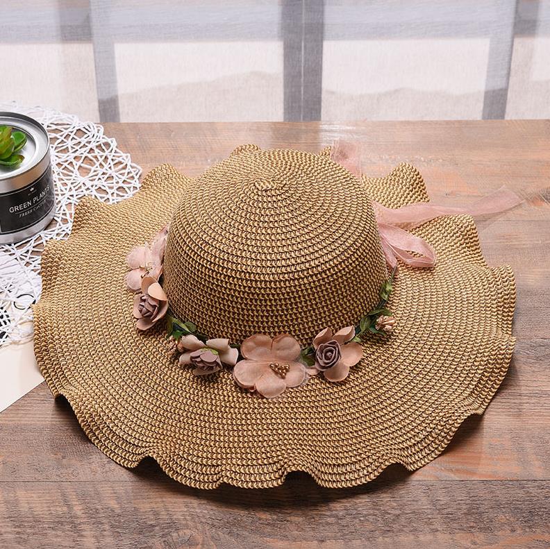Summer hat with floral decoration for women