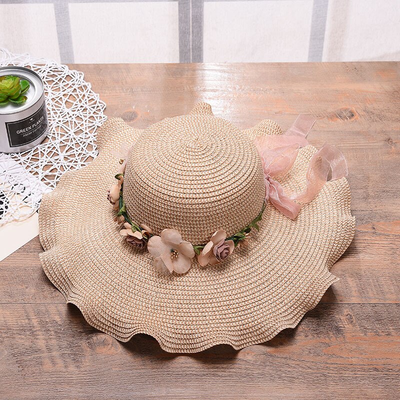 Summer hat with floral decoration for women