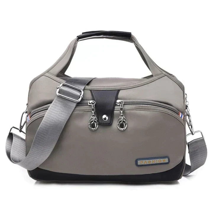 Damen Handtasche mit Schultergurt und mehreren Fächern