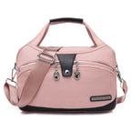 Women's handbag with shoulder strap and multiple compartments
