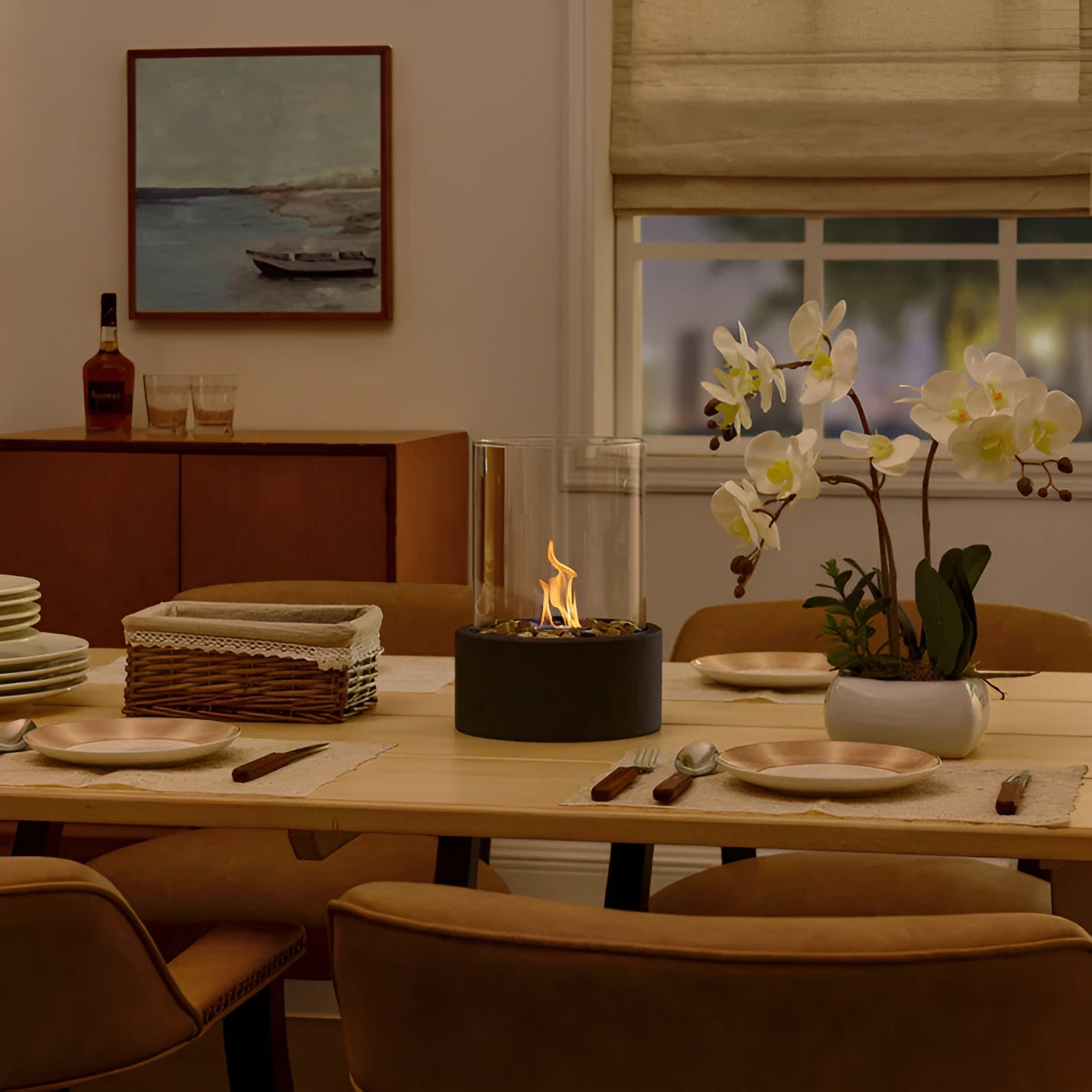 Table fireplace with glass cylinder and metal base