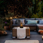 Table fireplace with glass cylinder and metal base