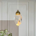 Crystal LED pendant light with faceted lampshade