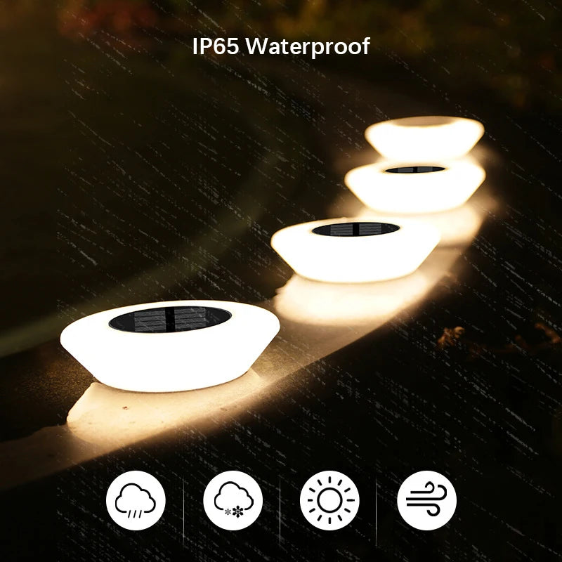 Solar ground light with 14 LEDs and 360° ground illumination – Set of 4