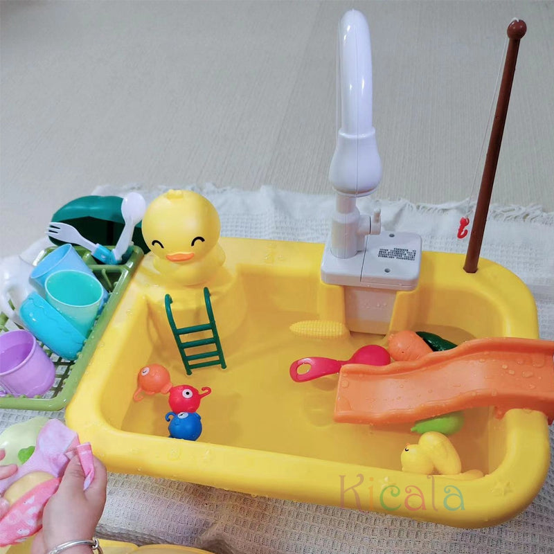 Water play table with fountain and toys