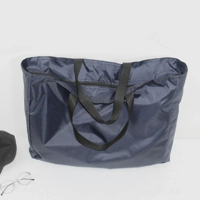 Foldable Waterproof Travel Bag – 4 Sizes, Black or Blue