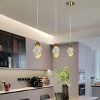 Crystal LED pendant light with faceted lampshade