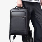 Leather backpack with USB charging port for 15.6-inch laptop