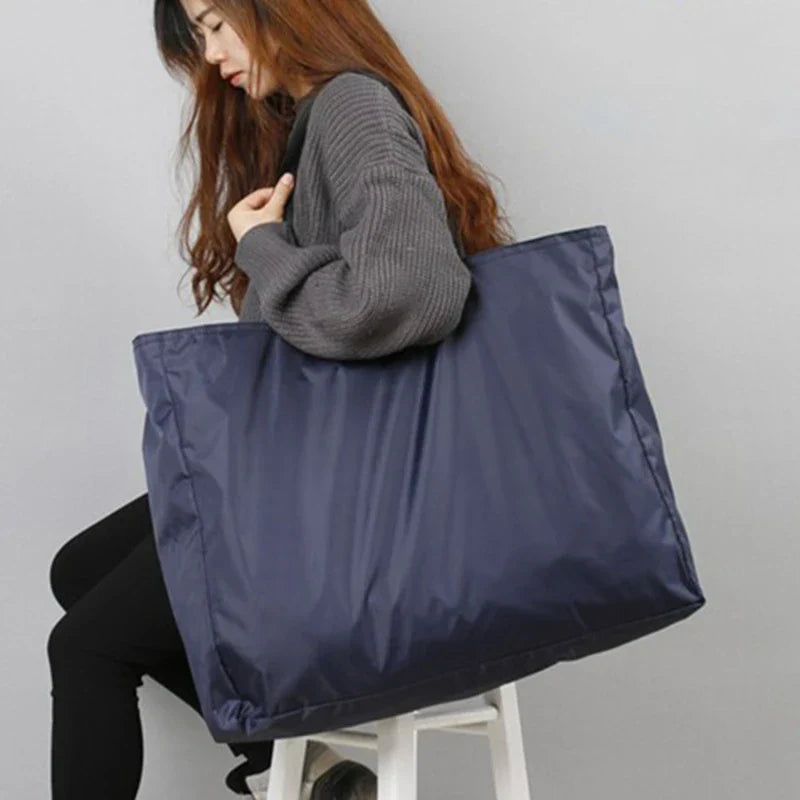 Foldable Waterproof Travel Bag – 4 Sizes, Black or Blue
