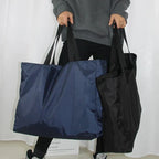 Foldable Waterproof Travel Bag – 4 Sizes, Black or Blue