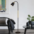 Stehlampe mit verstellbarem Lampenkopf und Bogenstab