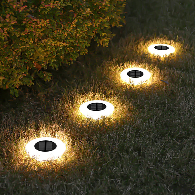 Solar ground light with 14 LEDs and 360° ground illumination – Set of 4