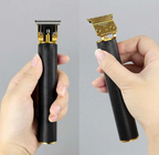 Cordless precision hair trimmer with T-blade