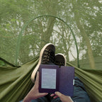 Outdoor hammock with mosquito net and sunshade